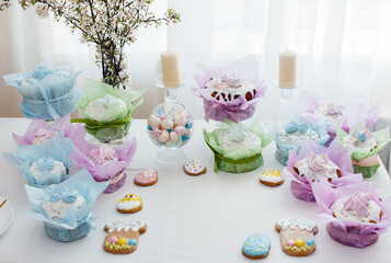 Beautiful Easter cakes on a decorated light table. A light holiday of Easter.