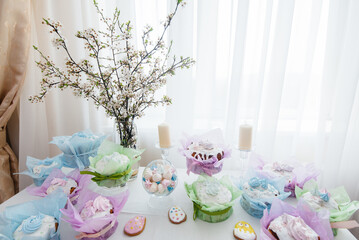 Beautiful Easter cakes on a decorated light table. A light holiday of Easter.