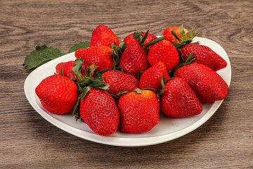 Ripe sweet strawberry with leaf