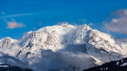 Fototapeta na wymiar Ski slopes under the Mont Blanc chain seen from the French side