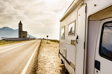 Caravan and church San Miguel, Cabo de Gata, Spain