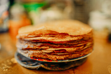 concept of a holiday Maslenitsa presented by hot fresh baked pancakes
