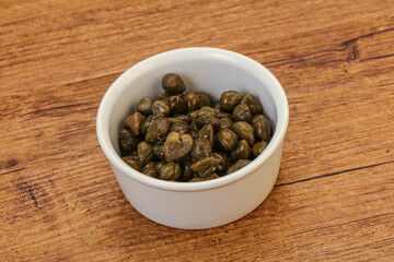 Tasty capers in the bowl