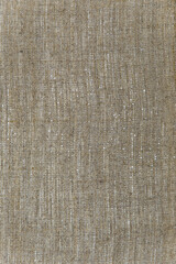 Fototapeta premium simple linen background: the reverse side of the primed canvas stretched over the frame, close, toning