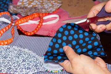 Manufacture of cloth masks, covid-19, global pandemic, selective focus