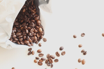 roasted coffee beans in a paper bag