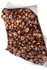 roasted coffee beans in a paper bag