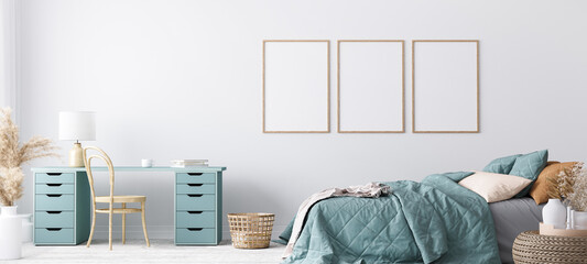 Blue Scandinavian bedroom with three vertical frames in bright design, poster mock up on white wall background	