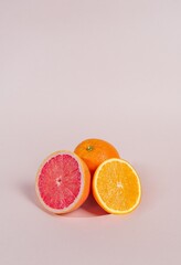 citrus fruits, grapefruits, mandarins, lemons, oranges, on a light background.