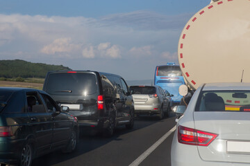 Fototapeta na wymiar Traffic jam on suburban highway