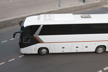 tourist bus on a multi-lane road.