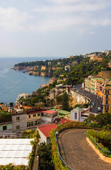 Fototapeta na wymiar Top view on the embankment of Naples. Panoramic seascape Napoli city with view of the port in the Gulf of Naples. The province of Campania, Italy.