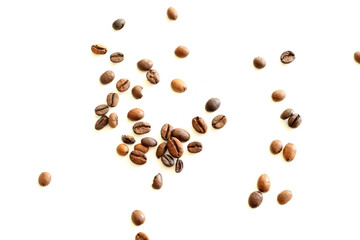 roasted coffee beans on white wooden background
