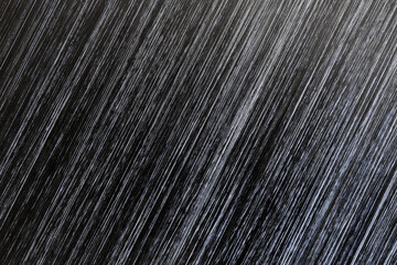 Obraz premium Fragment of electroplated, black painted and scratched metal sheet. Macro. Diagonal. Industrial backdrop or backdrop.