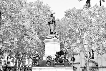 The statue in question is of William Ewart Gladstone (1809 - 1898) in London in b/w