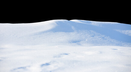 Fototapeta na wymiar white snowdrift with blue shadows, isolate on a black background