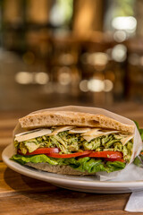 delicious sandwich on wooden table ready to eat