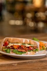 delicious sandwich on wooden table ready to eat