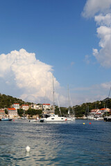 Fototapeta na wymiar Sailing boats in the picturesque port on island Lastovo, Croatia.