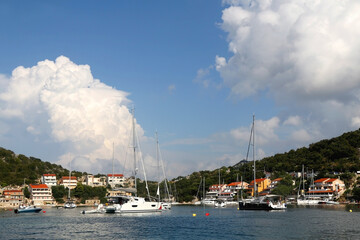 Fototapeta na wymiar Sailing boats in the picturesque port on island Lastovo, Croatia.