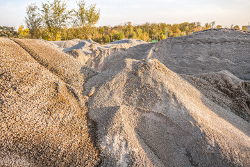 A pile of construction sand at a construction site.