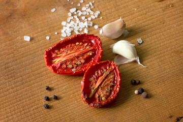 Cooking sun-dried tomatoes in the oven in the kitchen