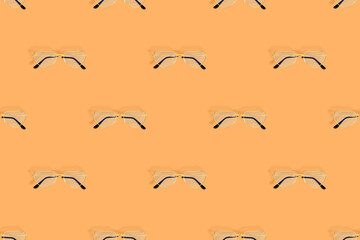 Glasses seamless pattern. Eyeglasses with heart-shaped lenses. 
