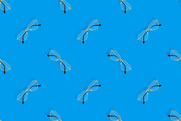 Glasses seamless pattern. Eyeglasses with heart-shaped lenses. 