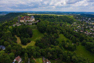 Fototapeta na wymiar Aerial view of old town of the city Coburg in Germany, Bavaria on a spring noon. 