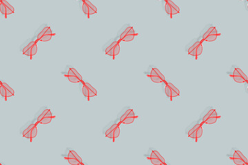 Glasses seamless pattern. Eyeglasses with heart-shaped lenses. 