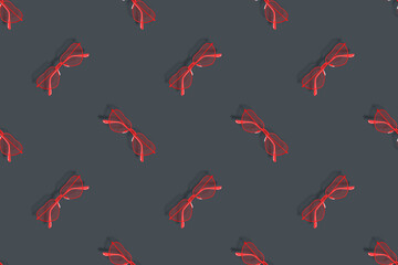 Glasses seamless pattern. Eyeglasses with heart-shaped lenses. 