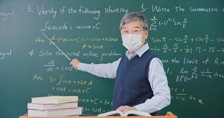 Senior professor teaching online