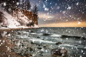 Beautiful landscape of the cliff in Gdynia Orłowo in snowy winter, Baltic Sea. Poland
