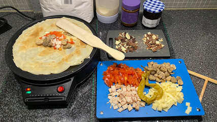Crepe on Crepes Maker with Ingredients - 410423987