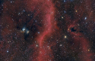 Dark space in shades of red. Elements of this image were furnished by NASA.