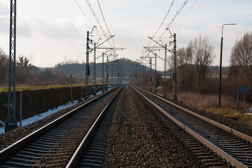 Fototapeta na wymiar With an electified railway line