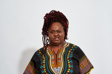 Obnoxious woman with blinking eye and crooked mouth
