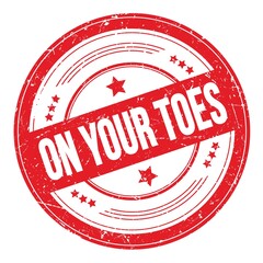 ON YOUR TOES text on red round grungy stamp.