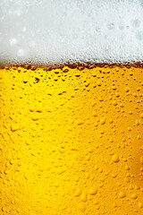 Beer background with bubble froth texture foam pouring alcohol soda in glass happy celebration party holiday new year concept object design