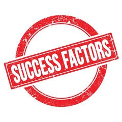 SUCCESS FACTORS text on red grungy round stamp.