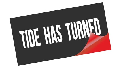 TIDE  HAS  TURNED text on black red sticker stamp.