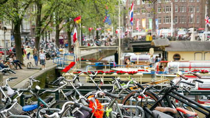 Amsterdam, canals, harbor and bikes. City travel concept.