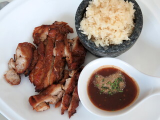 Top view of Thai food, sticky rice,Roast chicken, dipping sauce