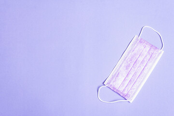 Fashion lilac masks isolated on glamour purple background