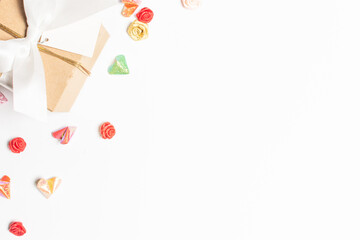 Frame made of heart shape paper on white background. Top view with copy space.