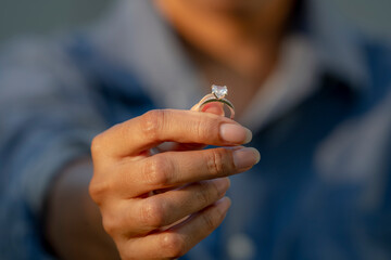Sad Wife Take off the diamond wedding ring from finger. Quarrel fight of breakup Conflict, bad...
