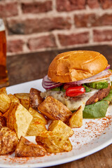Vegetarian Burger with Potatoes and Beer.