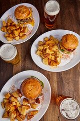 Tasty burgers with Beers ready to enjoy with friends