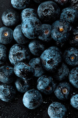 Fresh natural antioxidant blueberries pile, macro detailed close up