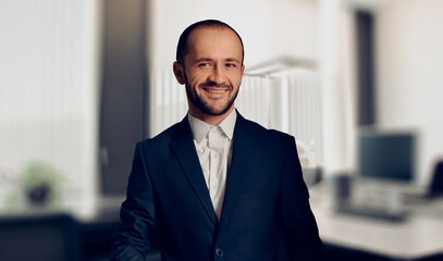 Fototapeta premium Happy smiling young businessman